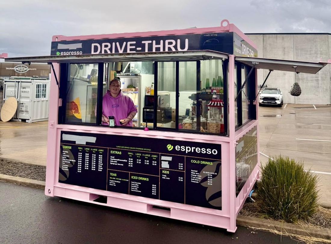 The Candied Courage drive-thru coffee container on site at Wash N Shine